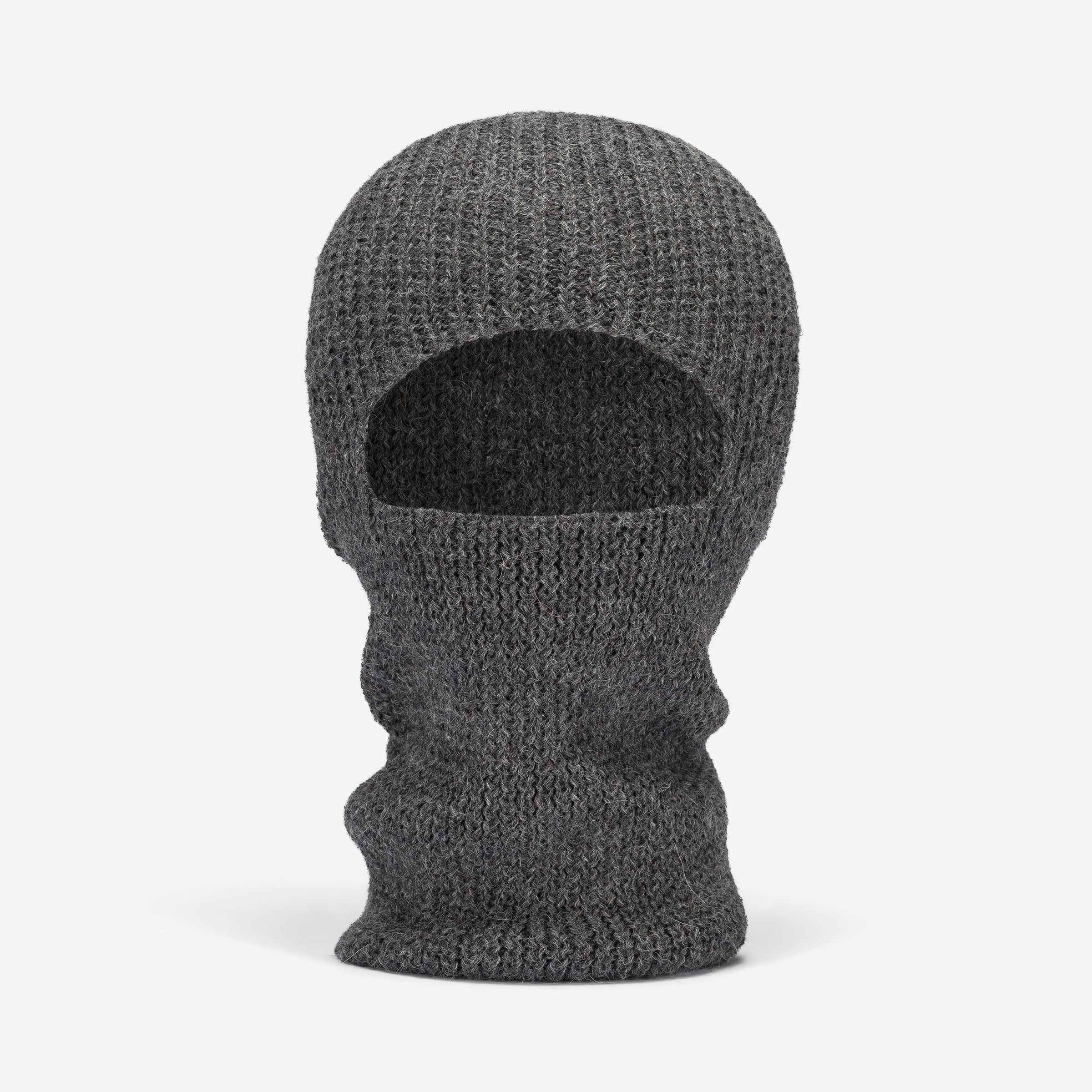 A charcoal gray hand-knitted alpaca balaclava covering the head and neck, with a hole for the mouth.