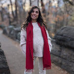 Woman wearing a red scarf in Central Park