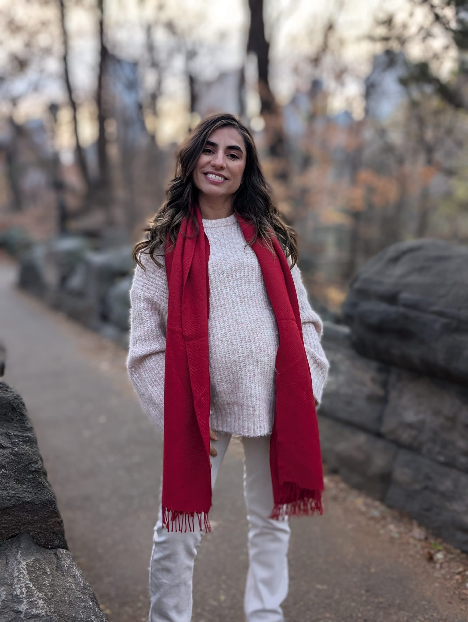 Woman wearing a red scarf in Central Park