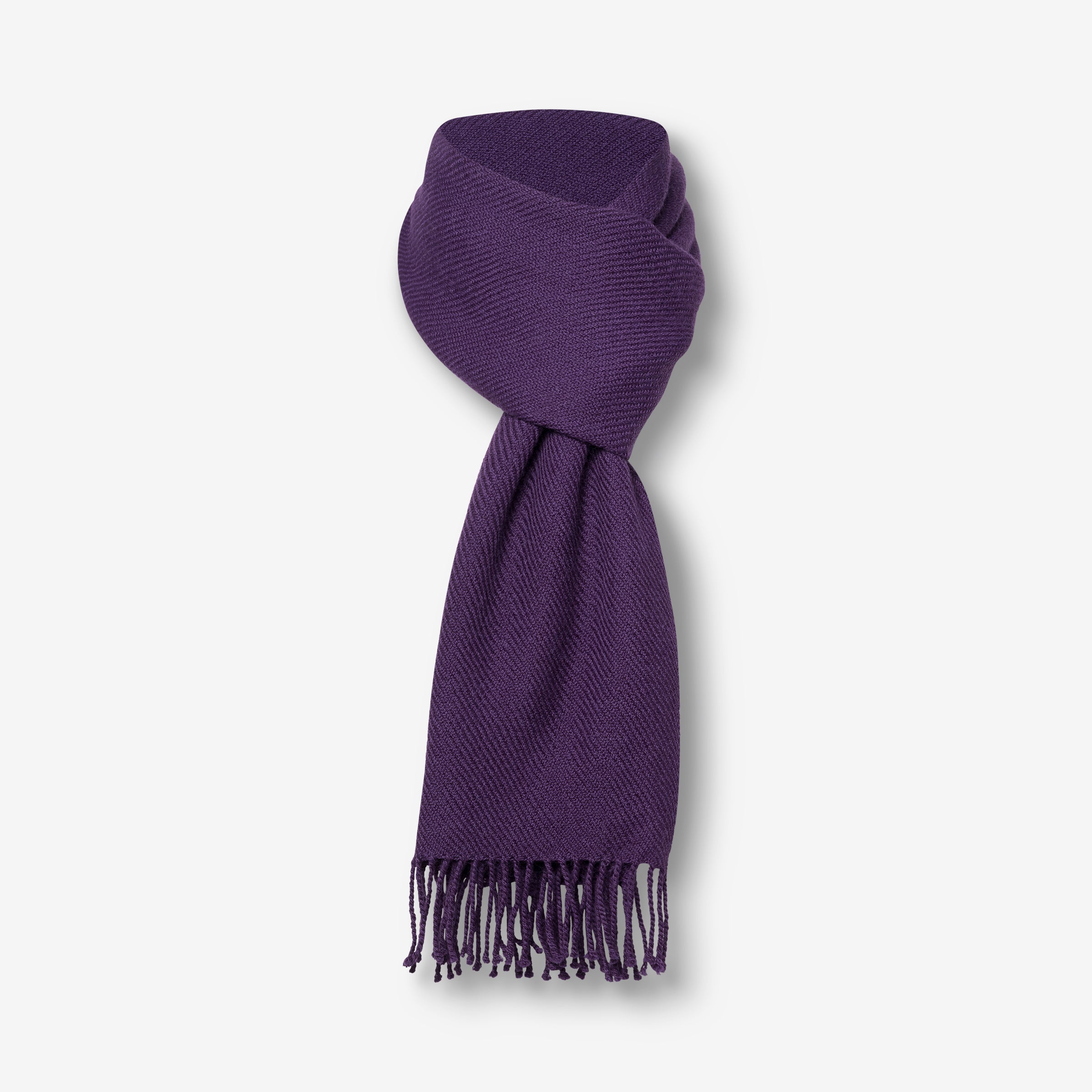 A handwoven alpaca stole in Andes Purple, displayed on a plain background.
