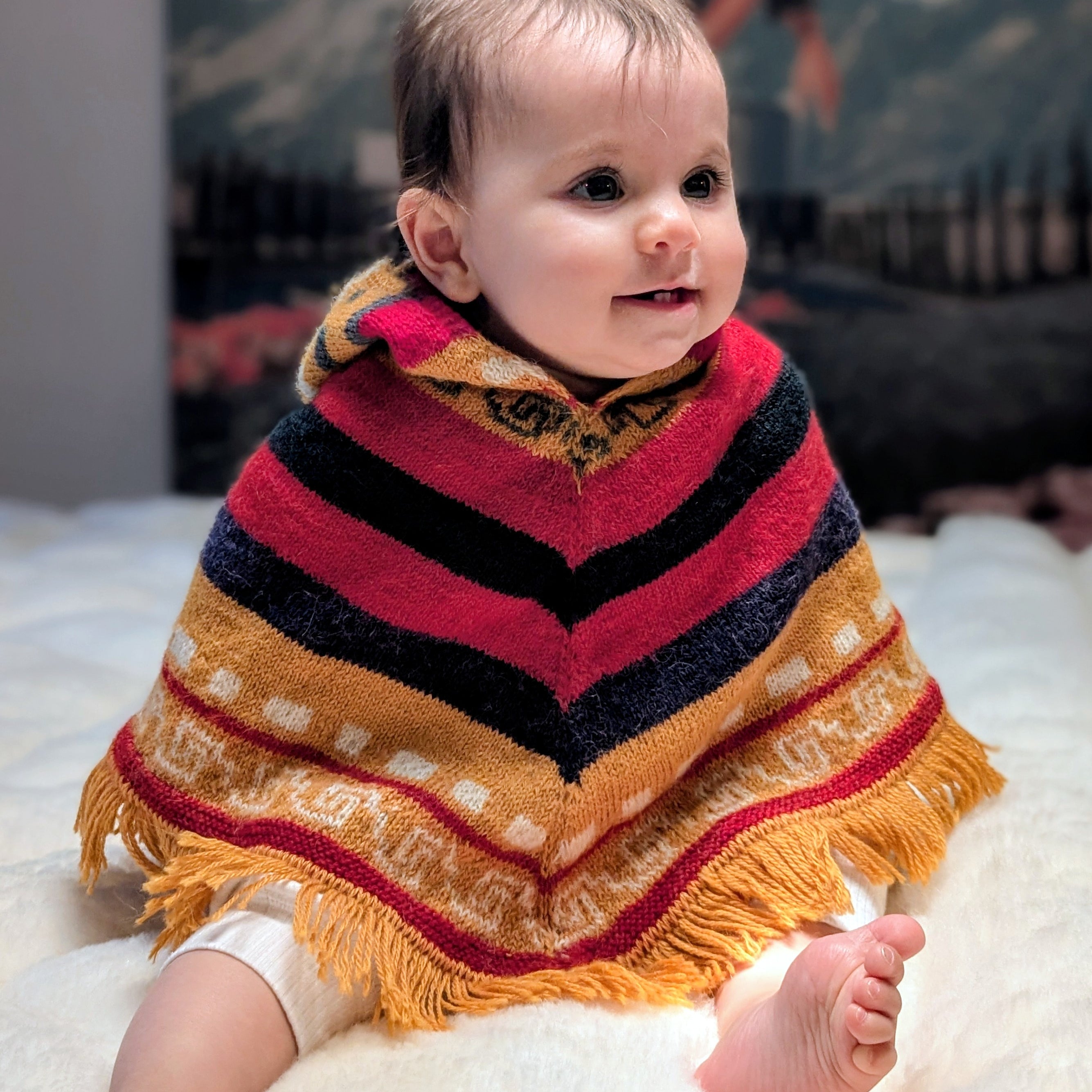 Hand-Knit Alpaca Baby Poncho Sunset Tones